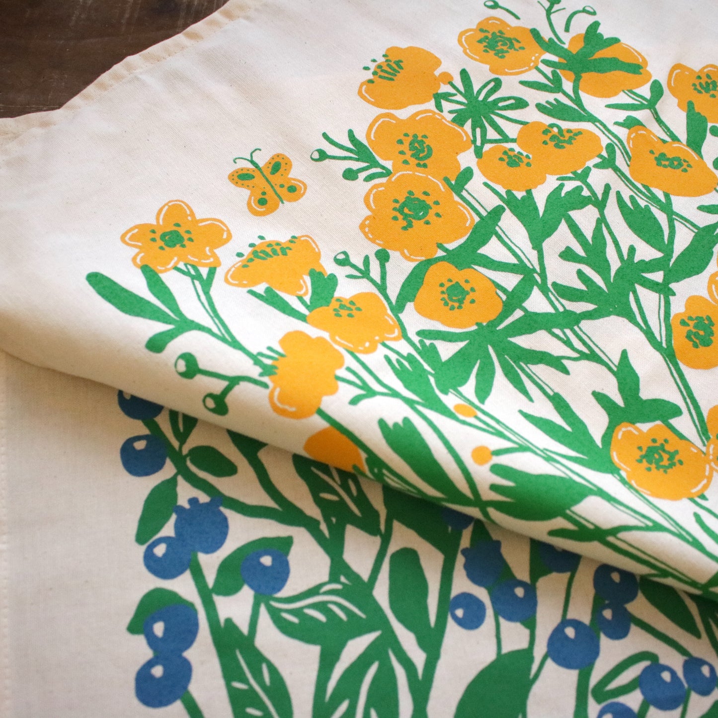 Screen printed tea towel "Buttercup Season"