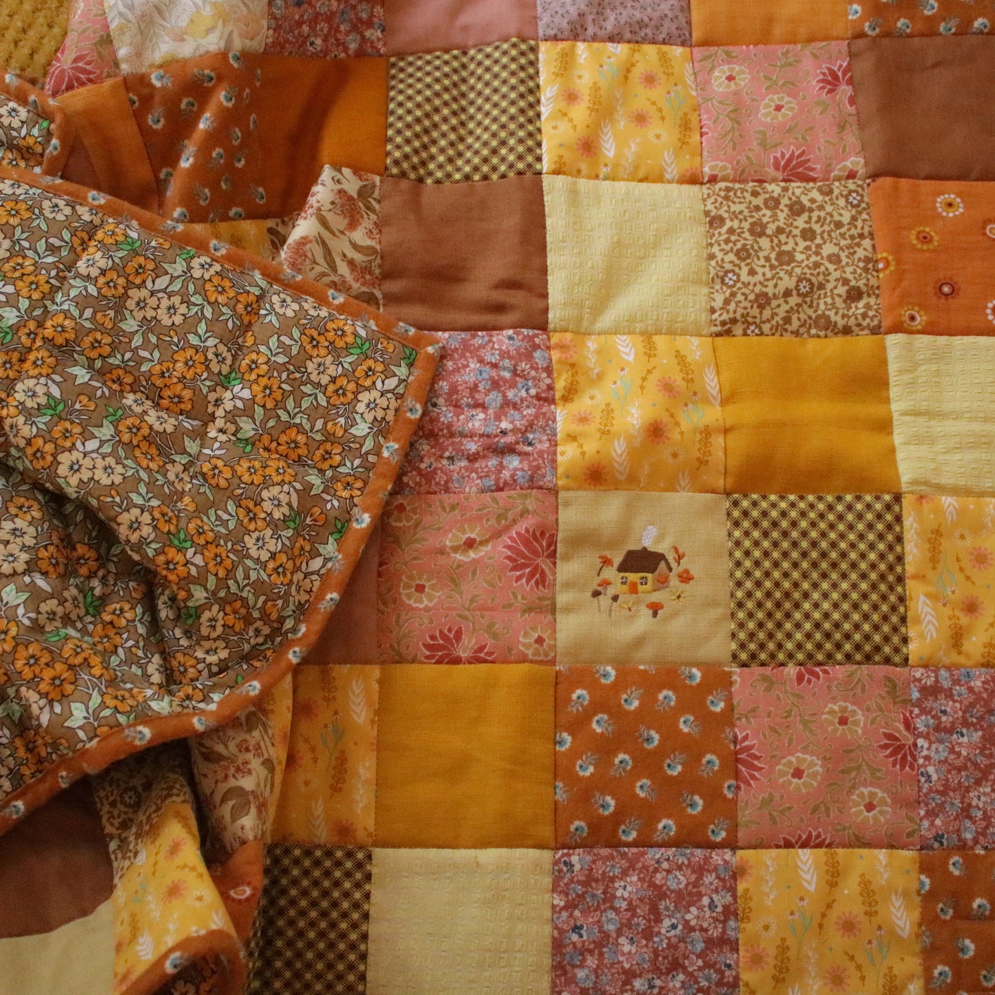 Heirloom Patchwork Bed Runner with an Embroidery "Marigold"